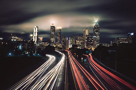 time lapse photography of cars on city thumbnail