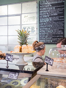 slices of pineapple on rack inside restaurant thumbnail