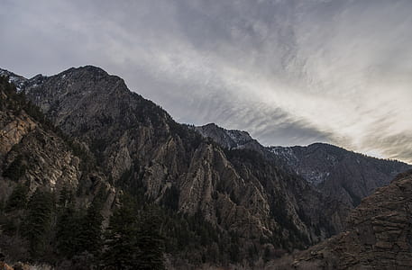 gray mountains under gray sky at day thumbnail