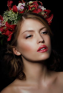 woman wearing flower head dress thumbnail