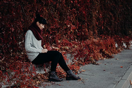 Woman Sitting on the Pavement thumbnail