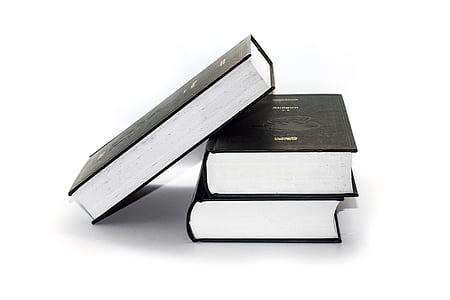 three black hardbound books thumbnail