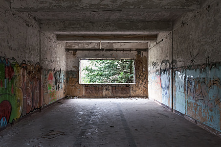gray tenement with graffiti thumbnail