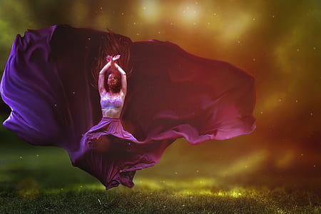 woman raising both hands with dress going upward thumbnail