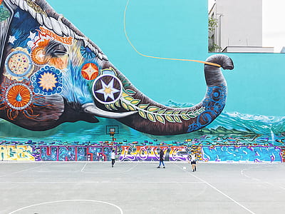 three people near basketball hoop thumbnail