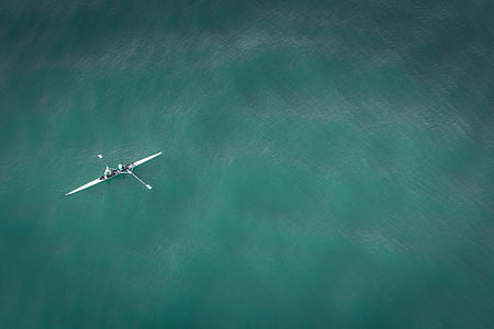 two people riding kayak in ocean thumbnail