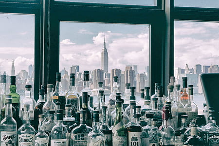 Assorted Bottles Near Windows thumbnail
