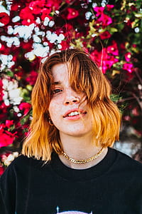 woman wearing gold-colored Cuban chain necklace thumbnail