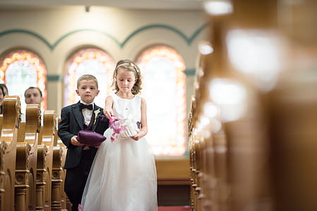 Boy And Girl Walking Down The Aisle thumbnail
