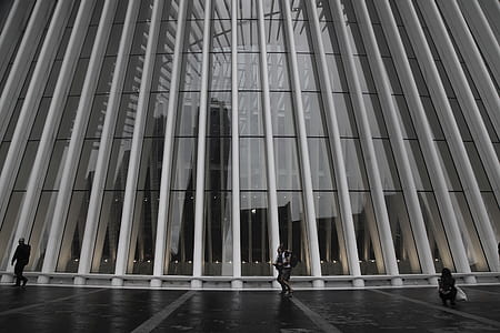 person standing in front of building thumbnail