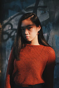 woman wearing red knitted shirt thumbnail