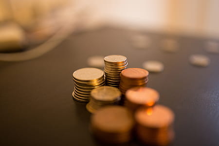 selective photography of coins thumbnail