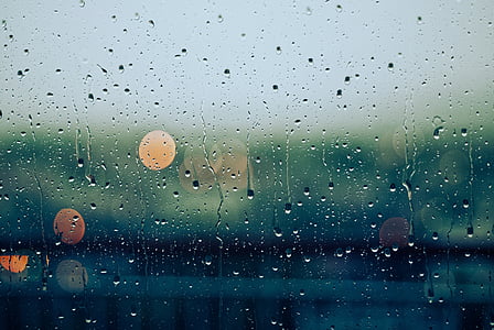 close-up photography of dews on clear glass thumbnail