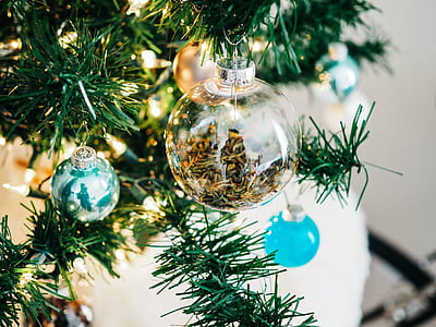 clear glass bauble on Christmas tree thumbnail