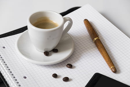 white ceramic mug on saucer thumbnail