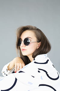 Woman Wearing White And Black Shirt thumbnail