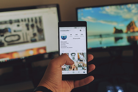 person holding Android smartphone thumbnail