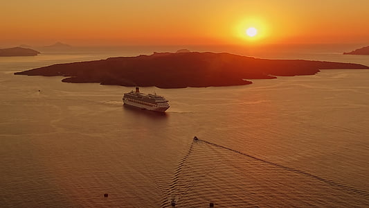 cruise ship on body of water during sunset thumbnail
