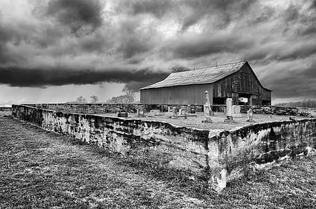 grayscale photography of barn house thumbnail