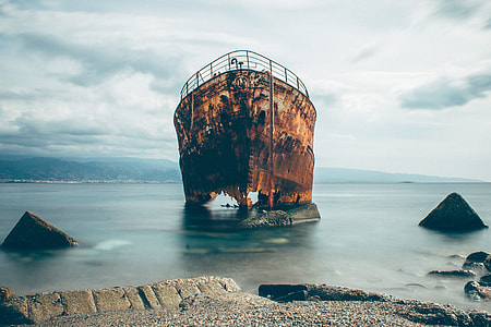 shrinking ship on seashore thumbnail
