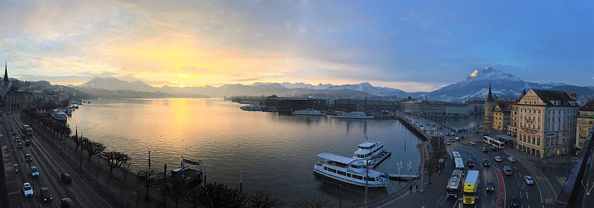 aerial photography of city beside body of water thumbnail