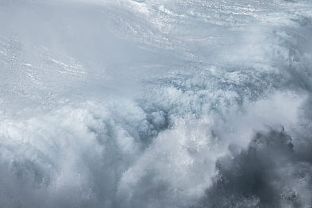 crashing waves at daytime thumbnail