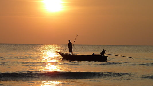 silhouette of two person standing on boat thumbnail