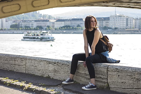 Woman in Black Tank Top and Black Leggings Sitting at Daytime thumbnail