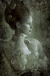 grayscale photo of woman in long-sleeved top thumbnail