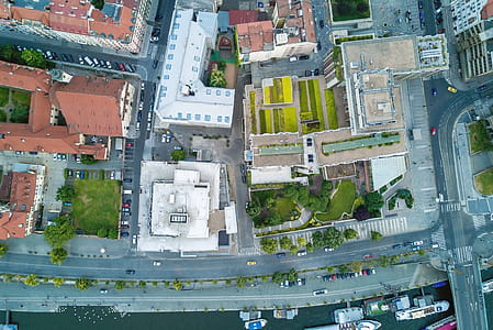 Aerial city view with crossroads and roads, houses, buildings thumbnail