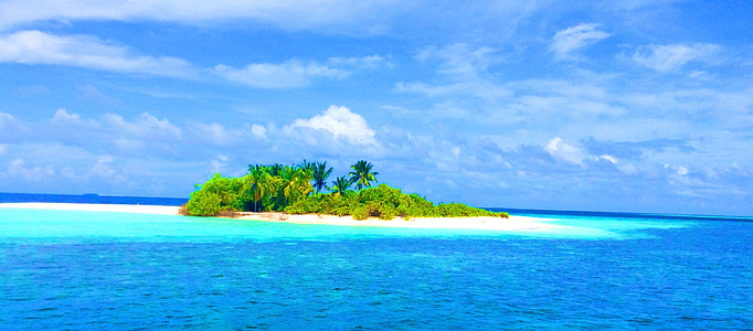 islet between body of water at daytime thumbnail