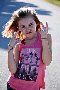 girl doing peace hand symbol thumbnail