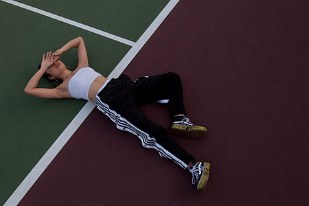 woman lying on court thumbnail