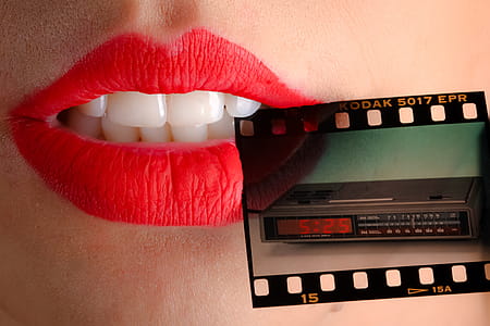 Person Wearing Red Lipstick Biting Film thumbnail