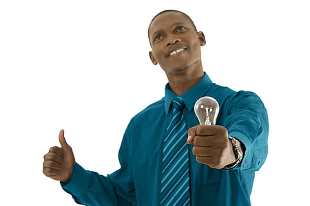 man holding LED bulb while smiling thumbnail