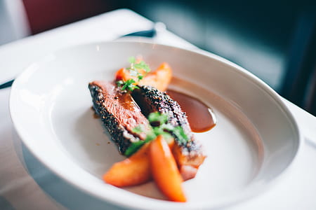 cooked meat on white ceramic platter thumbnail