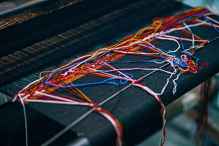 black and multicolored fringe textile thumbnail