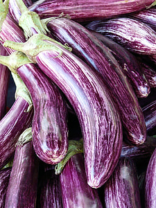 piled up purple eggplants thumbnail