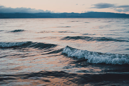 landscape photography of calm sea waves during golden hour thumbnail
