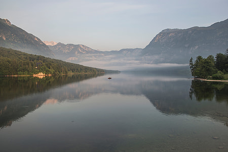 body of water near mountain thumbnail