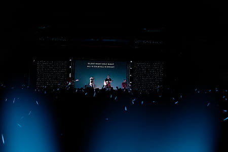rock band performing on stage thumbnail