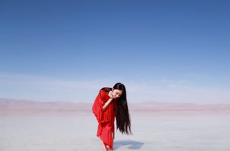 woman standing on brown soil thumbnail