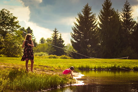 girl sitting near lake thumbnail