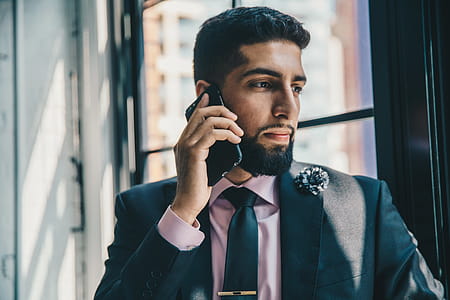 Stylish Man On Phone Photo thumbnail