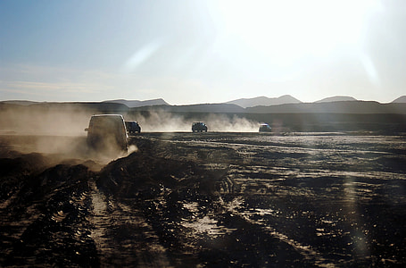 four running vehicles on road thumbnail
