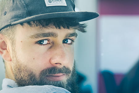 man looking at the camera thumbnail