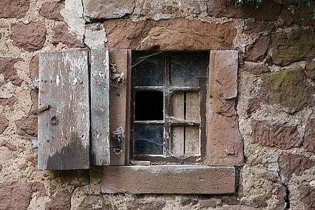 brown window surrounded with wall thumbnail