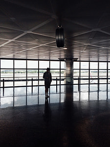 person standing inside concrete establishment thumbnail