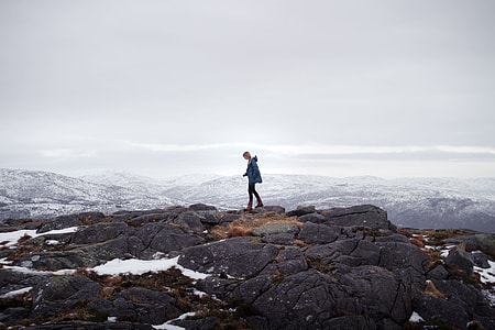 person standing on top of the mountain thumbnail