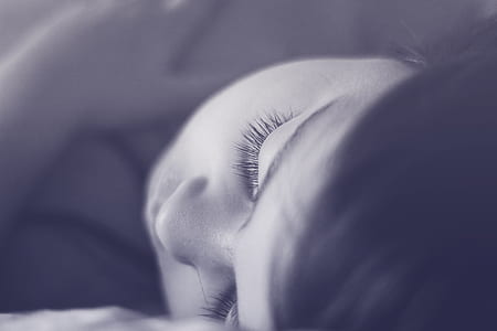 grayscale photo of woman sleeping thumbnail
